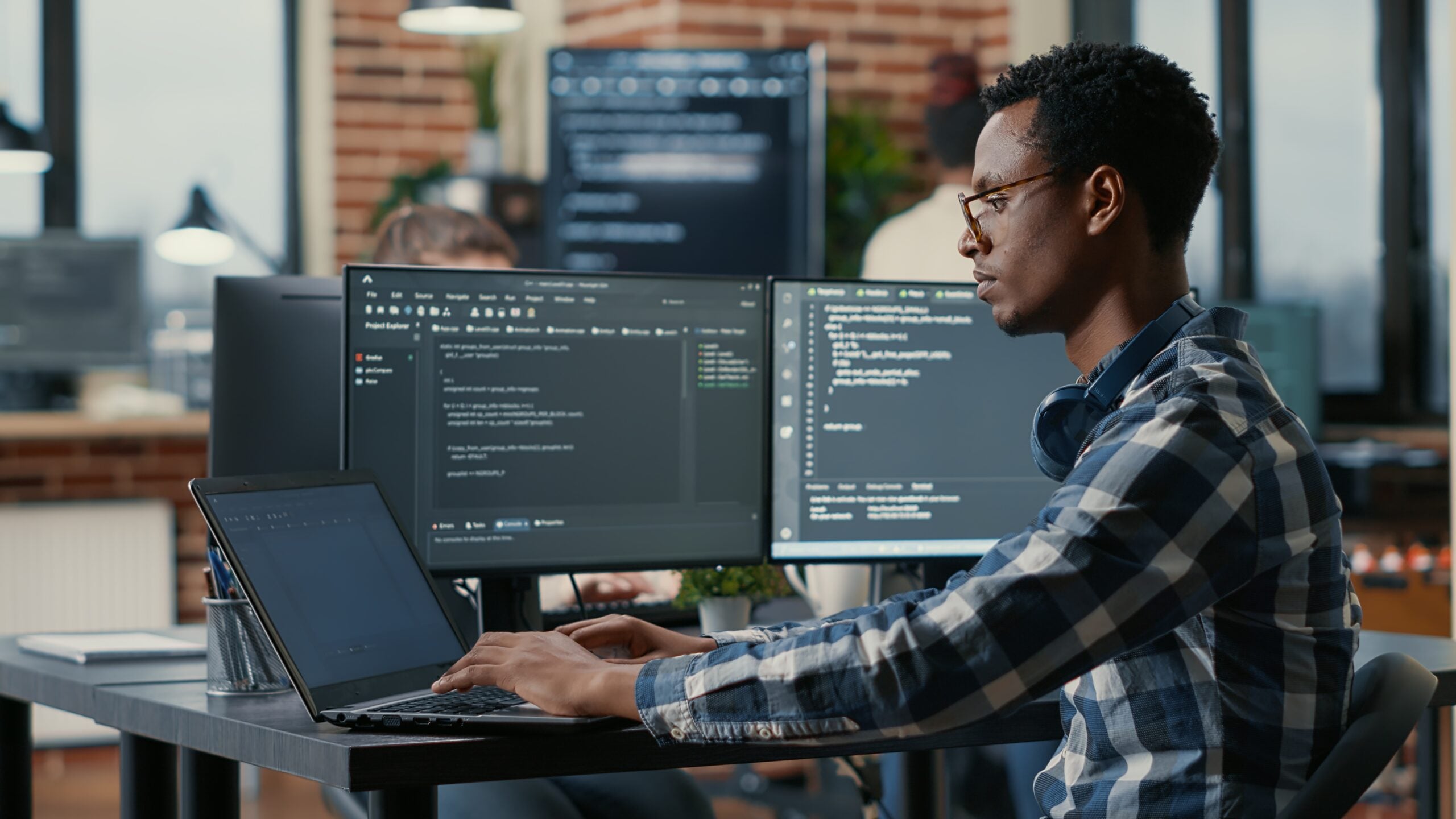 Software engineers collaborating in a modern workspace